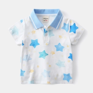 Detail of baby boy polo shirt with light blue collar and watercolor star patterns
