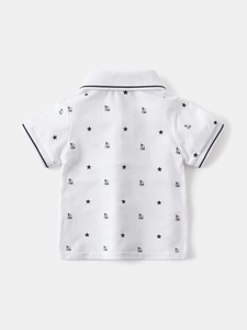 White boys short sleeve polo shirt with nautical sailboat prints and navy striped collar