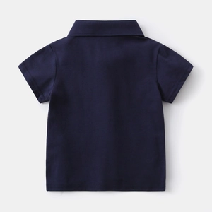 Rear view of navy blue cotton polo shirt showing minimalist collar design and fabric texture