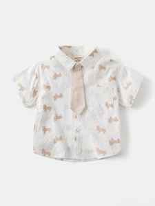 Short sleeve white cotton shirt for boys featuring all-over brown pony print and matching tie