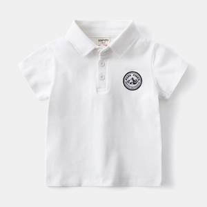 Detail of white cotton polo shirt collar with embroidered Peak Pines chest badge