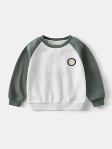 Boys raglan sleeve waffle sweatshirt in white and dark green with chest embroidery