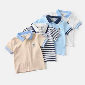 Detail of four colorful toddler polo shirts with animal embroidery and ribbed collars