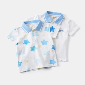 Close-up of cotton baby polo shirt with ribbed collar and star patterns