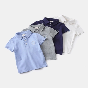 Polo per bambini in cotone con ricamo nautico e colletto a rever in diversi colori