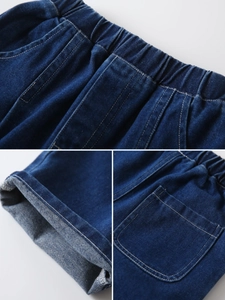 Classic dark blue boys denim shorts with elastic waist and stitched back pocket details