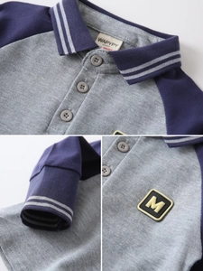 Polo a maniche lunghe per bambini con maniche raglan colorblock e stemma college