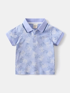 Front view of boys' light blue polo shirt with cartoon bear prints and striped trim