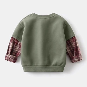 Back view of boy's two-piece style sweatshirt with olive green body and plaid sleeves