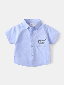 Short sleeve light blue cotton boys' shirt with pocket print and textured fabric