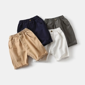 Flat lay of boys cotton casual shorts in khaki, navy, white and army green colors