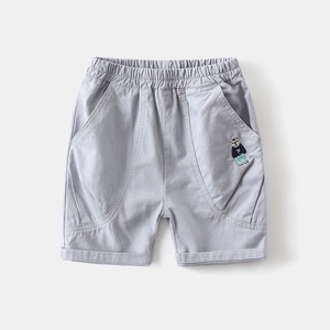 Close-up of boys casual shorts featuring high-quality bear embroidery and elastic waistband