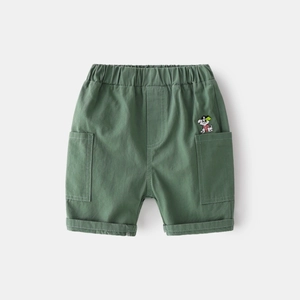 Detail of army green cotton boys' shorts with elastic waist and cute puppy embroidery