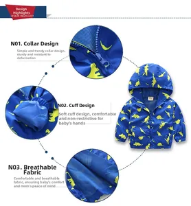 Detail of blue toddler windbreaker with dinosaur prints, mesh lining and elastic cuffs