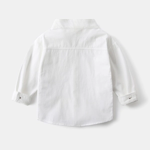 Rear flat lay view of a white long-sleeved cotton shirt for boys with clean back seam detail