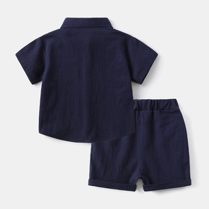 Rear view of dark blue linen kids shirt and shorts set with elastic waistband detail