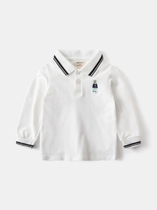 Boys white long sleeve cotton polo shirt with embroidered bear and striped collar accents