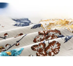 Close-up of soft breathable cotton fabric with vintage floral print for boys' t-shirts