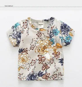 Detailed flat lay of boys grey cotton T-shirt featuring vintage floral prints