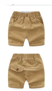 Front and back view of khaki cotton twill shorts for boys with elastic waist and pockets