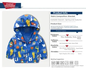 Detail of blue kids hooded jacket featuring colorful cartoon animal prints and mesh lining