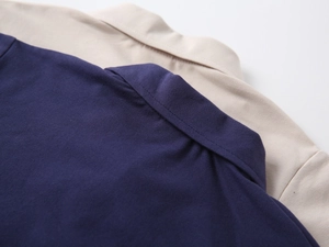 Close-up of polo shirt collar sewing and breathable pique cotton texture details