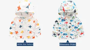 Detail of lightweight toddler sun protection jackets with star and dinosaur prints