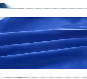Vue détaillée du tissu doux bleu foncé respirant pour vestes à capuche d'hiver enfant