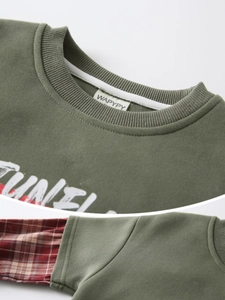 Army green kids' sweatshirt with red gingham sleeves and stitched brand label detail