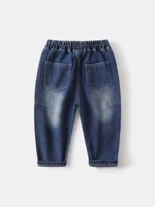 Boys' dark blue washed denim jeans with elastic waist and back pockets flat lay