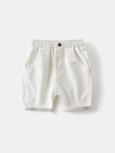 Minimalist white cotton summer shorts for boys with elastic waist and rolled cuffs