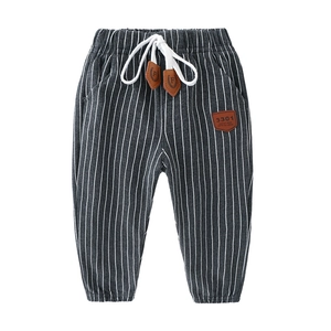 Toddler boys striped joggers with elastic waist and leather patch in dark grey color