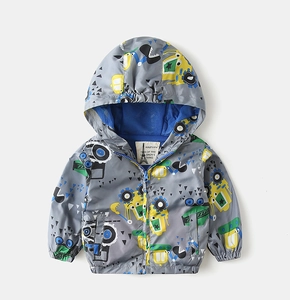 Detail of child hooded windbreaker with excavator prints and blue mesh lining