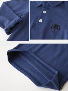 Detailansicht Baumwoll-Langarm-Poloshirt mit Reverskragen und Schirm-Stickerei