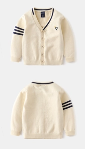 Detailed front and back view of children's knit cardigan with penguin crown embroidery