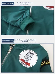 Detail of dark green bomber jacket showing rib cuffs and Cat HARING embroidery badge