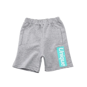 Gray boys sports shorts with elastic waist and unique blue printed tag detail