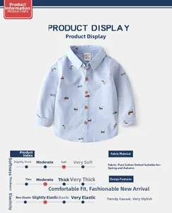 Detail of boys cotton oxford shirt with cartoon prints and soft texture info