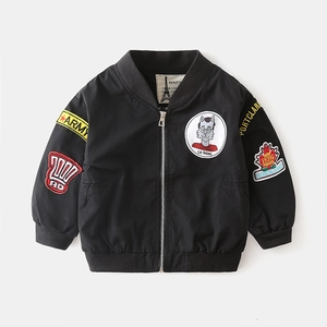 Classic black boys bomber jacket featuring embroidered patches and ribbed cuffs