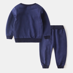 Flat lay of boys navy blue tracksuit with ribbed cuffs and elastic waist for sports