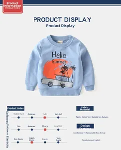 Détail du sweat-shirt en coton bleu clair montrant le tissu bouclé doux et l'imprimé
