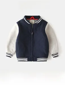 Detail of boys' baseball jacket featuring fleece quilting and soft cotton lining