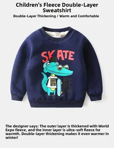 Close-up of kids navy thermal sweatshirt with crocodile skate pattern and soft fleece lining