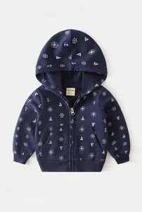 Close-up detail of navy blue nautical print hoodie showing cotton terry fabric texture