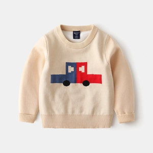 Boy's beige knit sweater featuring a pixelated red and blue car pattern and ribbed cuffs