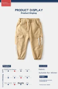 Detail of khaki kids winter cargo pants with elastic waist and side striped pockets