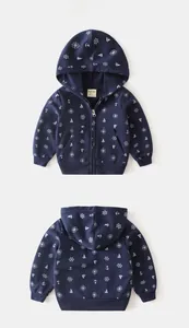 Detail of dark blue kids nautical hoodie featuring anchor prints and front zipper