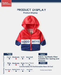 Detail of boys' color-block hooded jacket with front zipper and lettered pattern