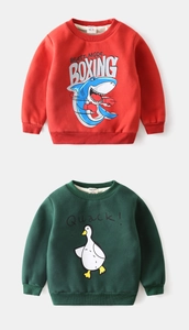 Detail of kids thermal sweatshirts in red shark and green duck cartoon designs