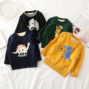 Detail of four colorful knit sweaters for kids featuring animal embroidery and ribbed necklines